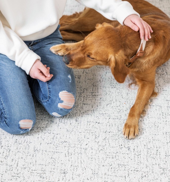 Lady with dog | Flooring Depot